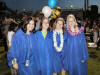 Jill and friends in their graduation gowns